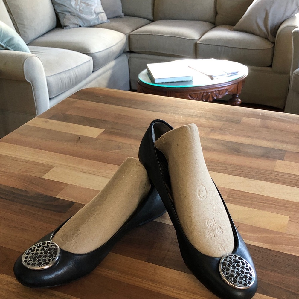 Coach Black Leather Ballet Flats with Silver Medallion